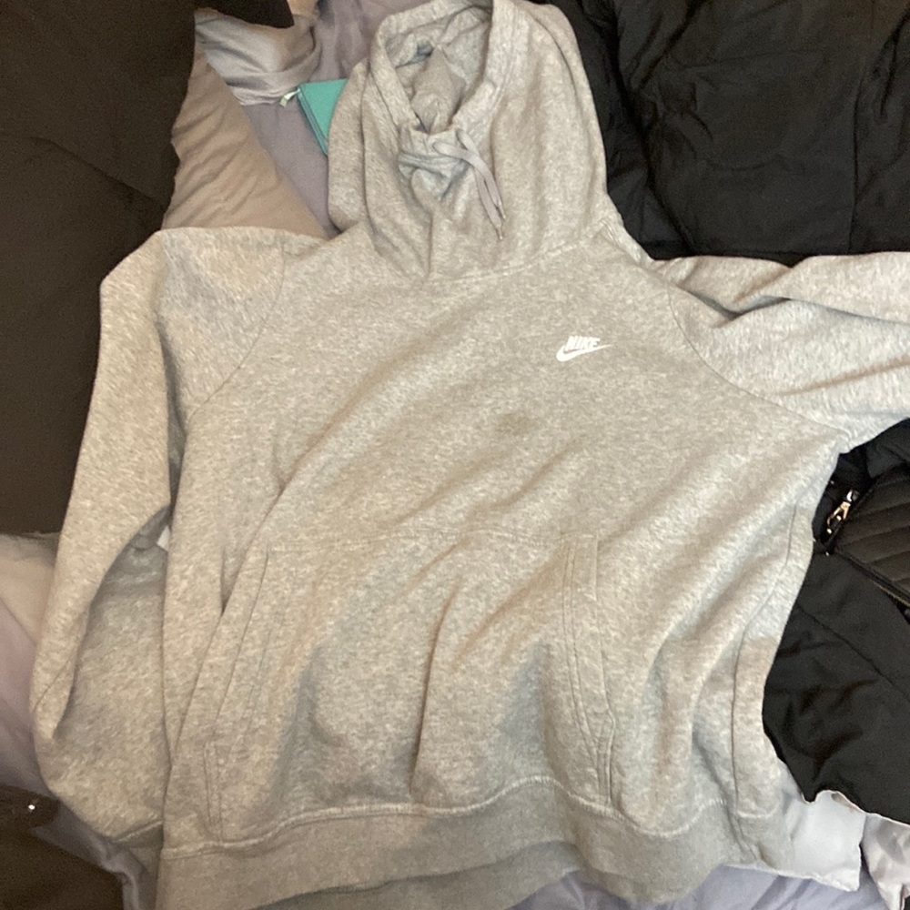 Grey Nike hoodie with extra long neck to stay warm